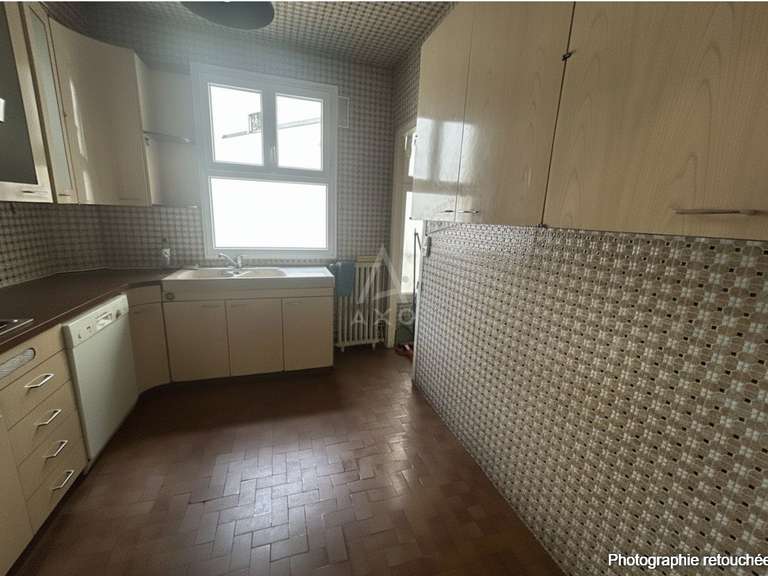 Appartement Paris 18e - 3 chambres - 115m²