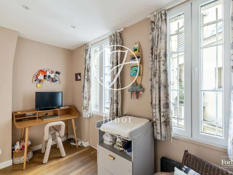 Appartement Paris 9e - 3 chambres - 104m²