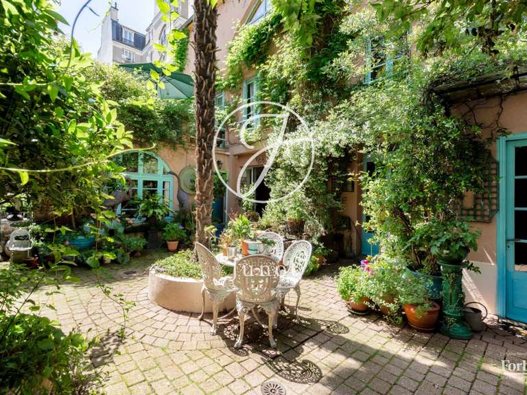 Appartement Paris 18e - 4 chambres - 184m²
