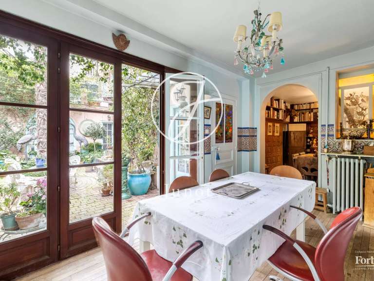 Appartement Paris 18e - 4 chambres - 184m²