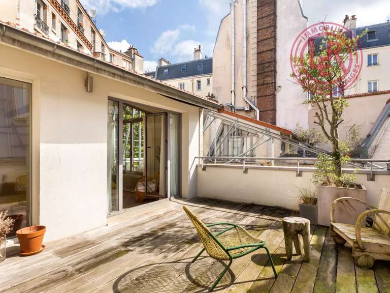 Appartement Paris 10e - 4 chambres - 240m²