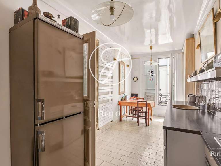 Appartement Paris 10e - 2 chambres - 115m²