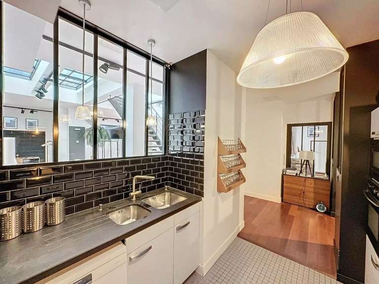 Appartement Paris 10e - 4 chambres - 345m²
