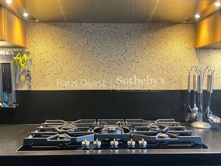 Appartement Paris 16e - 2 chambres - 210m²