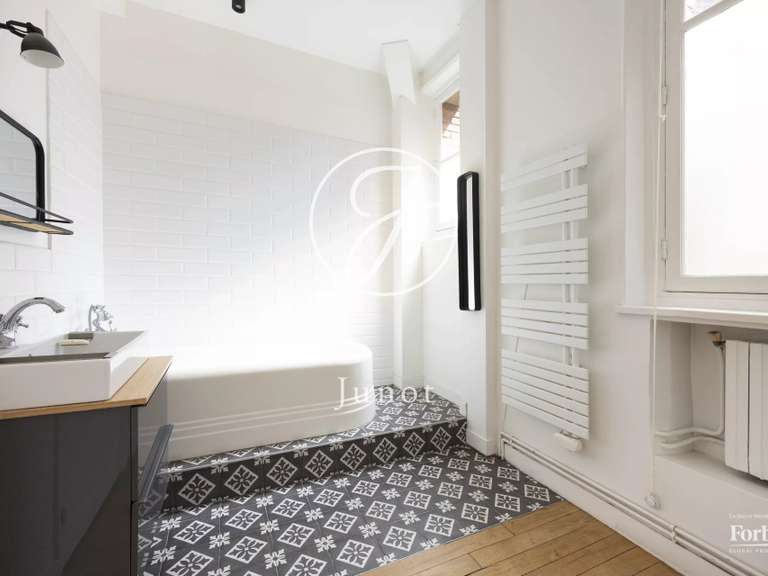 Appartement Paris 16e - 4 chambres - 150m²