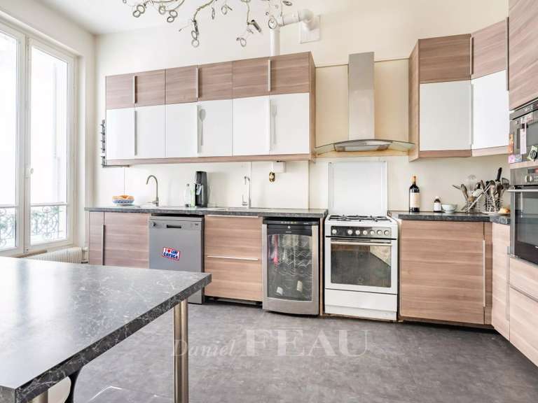 Appartement Paris 16e - 4 chambres - 210m²