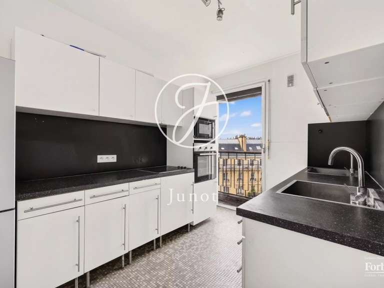 Appartement Paris 16e - 3 chambres - 128m²