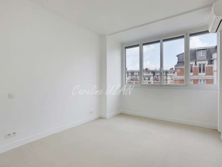 Appartement Paris 16e - 3 chambres - 174m²