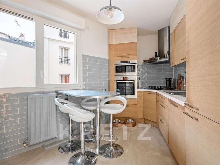 Appartement Paris 18e - 4 chambres - 130m²