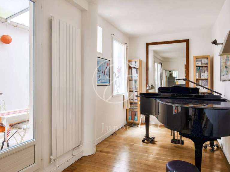 Appartement Paris 18e - 3 chambres - 104m²