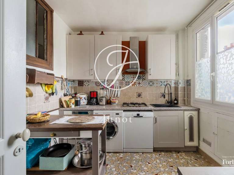 Appartement Paris 18e - 3 chambres - 103m²