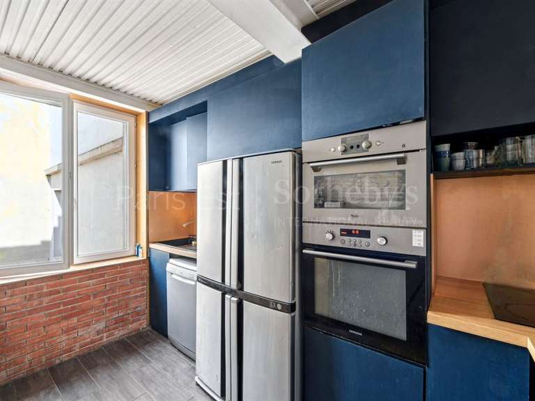 Appartement Paris 18e - 3 chambres - 123m²