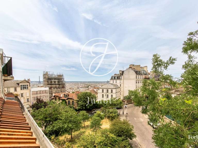 Appartement Paris 18e - 3 chambres - 107m²