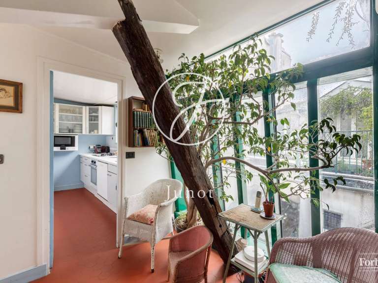 Appartement Paris 18e - 3 chambres - 107m²