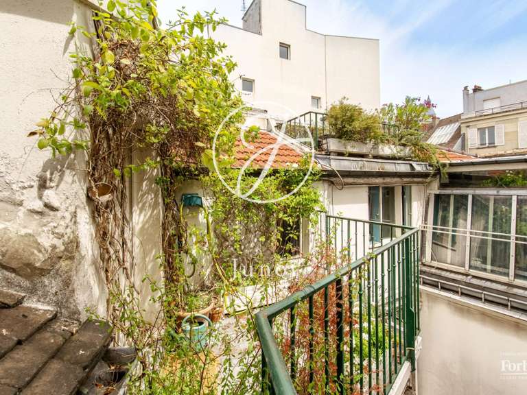 Appartement Paris 18e - 3 chambres - 107m²