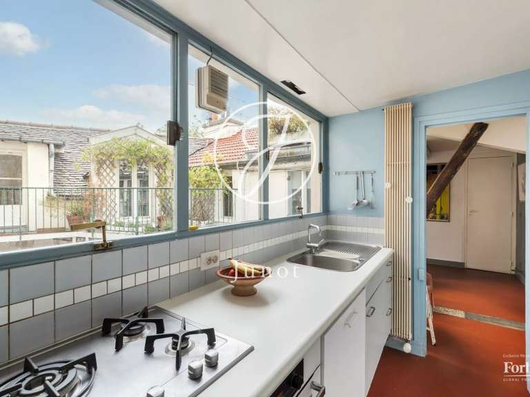 Appartement Paris 18e - 3 chambres - 107m²