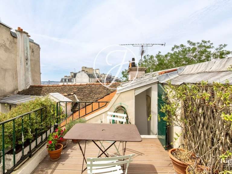Appartement Paris 18e - 3 chambres - 107m²