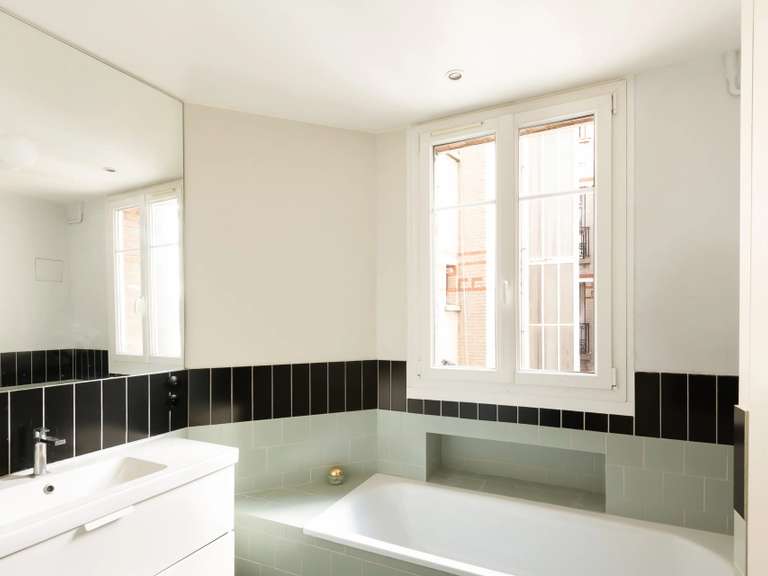 Appartement Paris 18e - 3 chambres - 110m²
