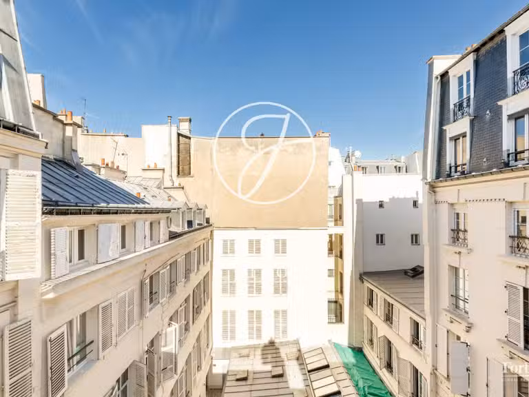 Appartement Paris 2e - 3 chambres - 100m²