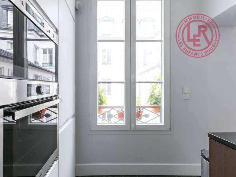 Appartement Paris 3e - 3 chambres - 88m²