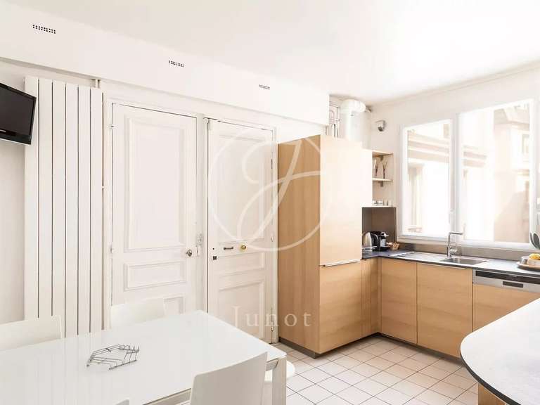 Appartement Paris 9e - 3 chambres - 128m²