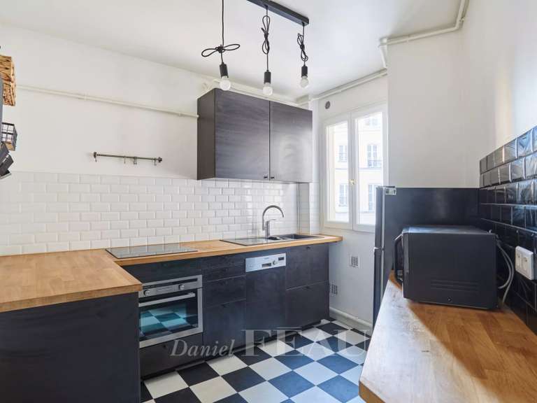 Appartement Paris 9e - 3 chambres - 117m²