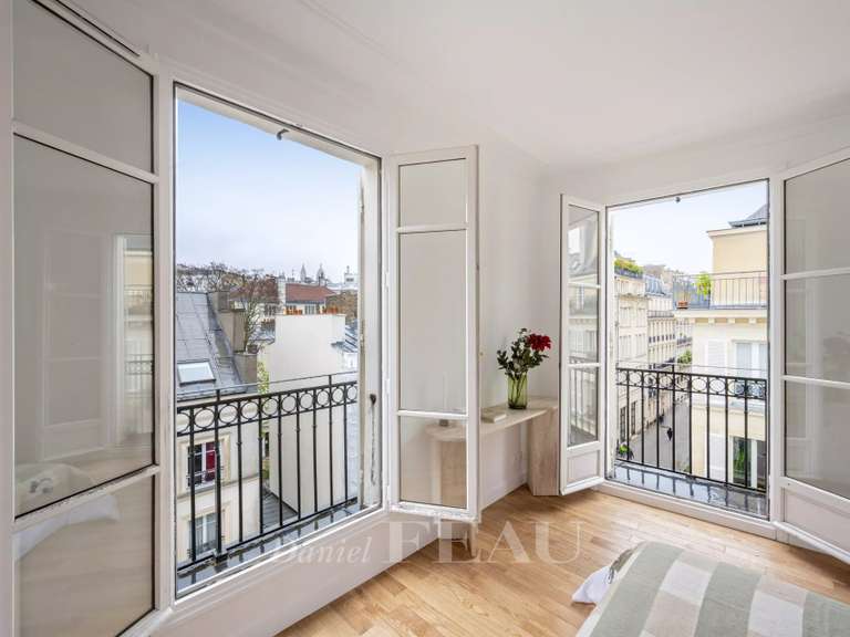 Appartement Paris 9e - 4 chambres - 124m²