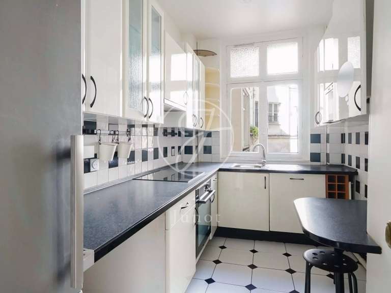 Appartement Paris 9e - 3 chambres - 117m²