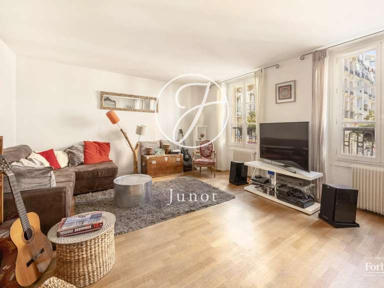 Appartement Paris 9e - 4 chambres - 112m²