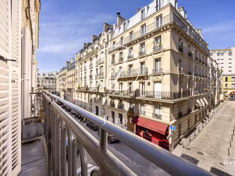 Appartement Paris 9e - 4 chambres - 112m²